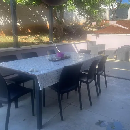 House In Center Near The