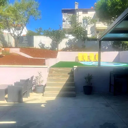 House In Center Near The